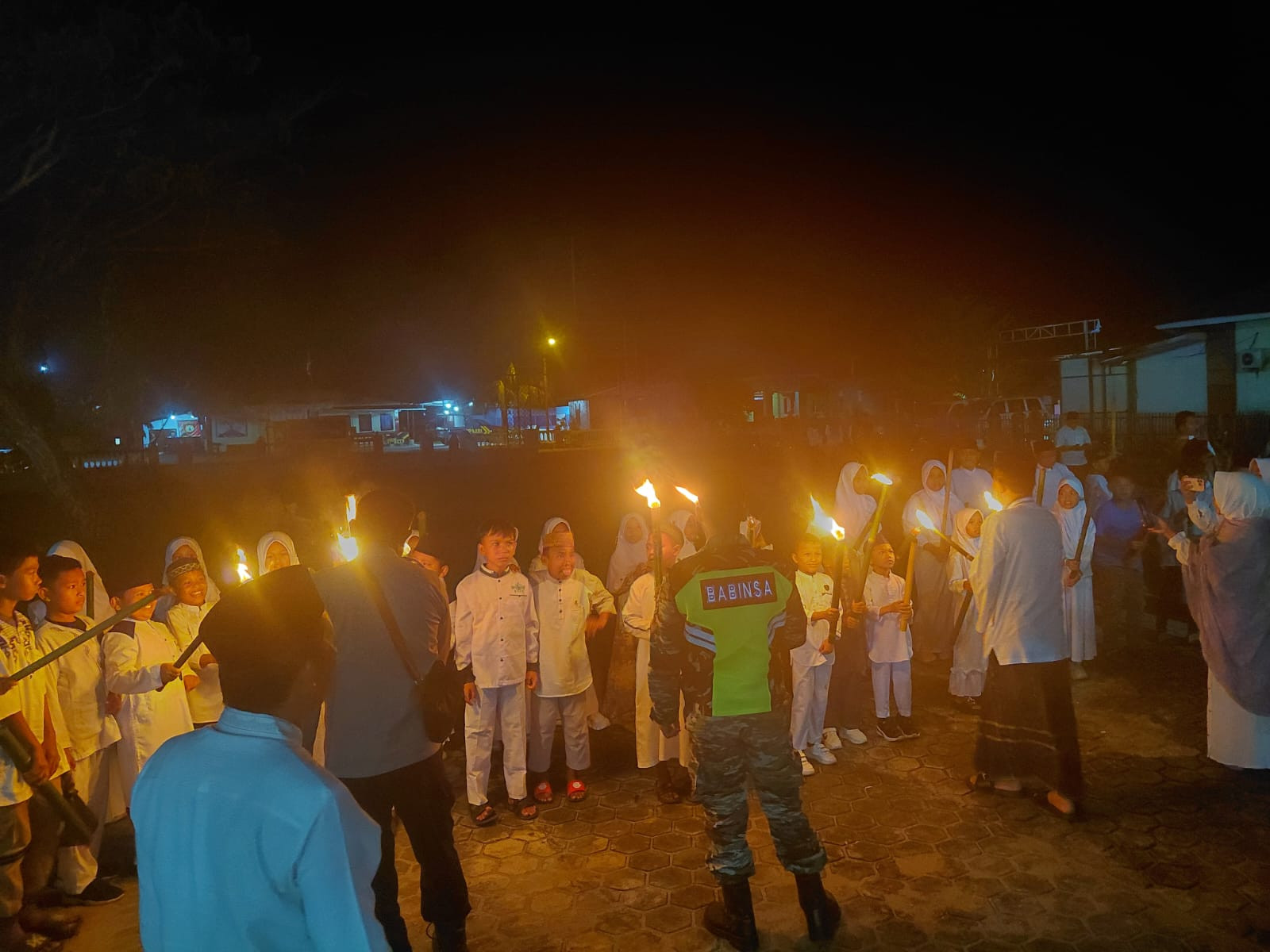 Pawai Obor Tahun Baru Islam 1448 Hijriah Tolangohula Dihadiri Babinsa Koramil Boliyohuto Bersama Unsur Pemerintah Dan Warga